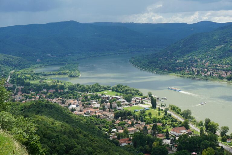 Stunning aerial shot of Visegrád Bend with scenic river and lush hills in Hungary.